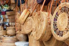 Balinese handmade rattan eco bags in a local souvenir market in Bali, Indonesia